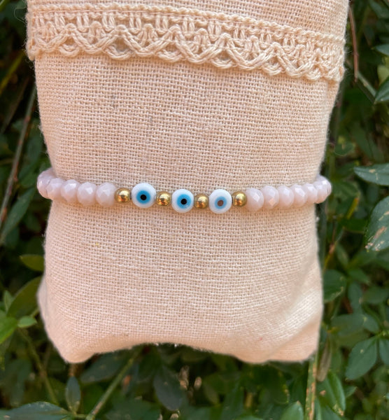 Bracelet élastique en perles de verre à facettes forme Oblate et Oeil Nazar Boncuk
