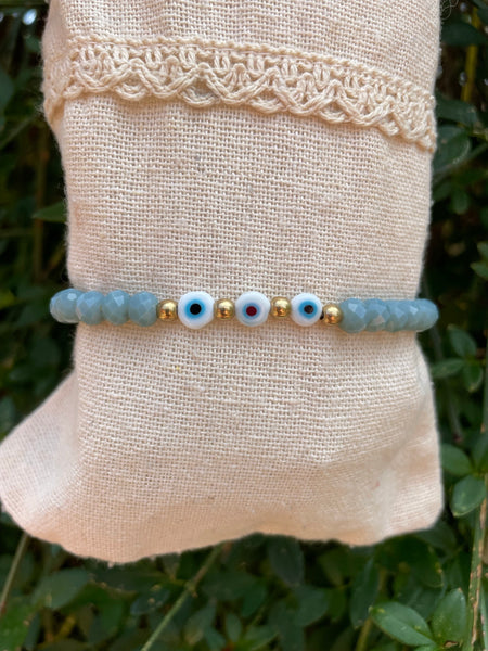Bracelet élastique en perles de verre à facettes forme Oblate et Oeil Nazar Boncuk