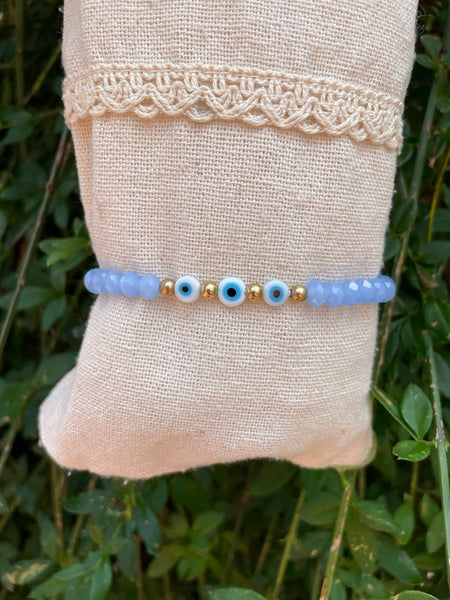 Bracelet élastique en perles de verre à facettes forme Oblate et Oeil Nazar Boncuk