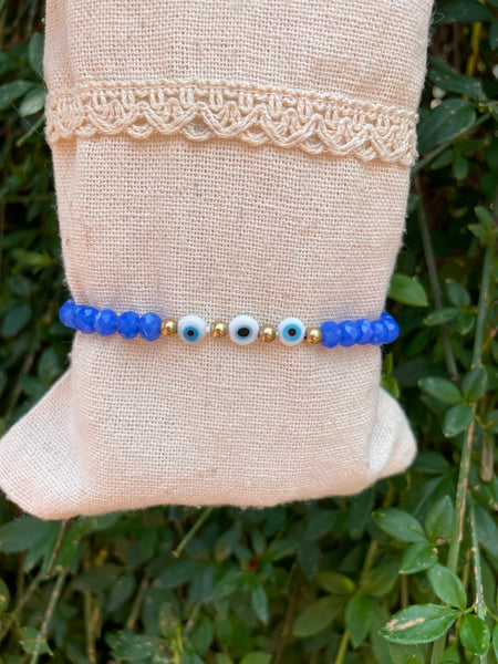 Bracelet élastique en perles de verre à facettes forme Oblate et Oeil Nazar Boncuk