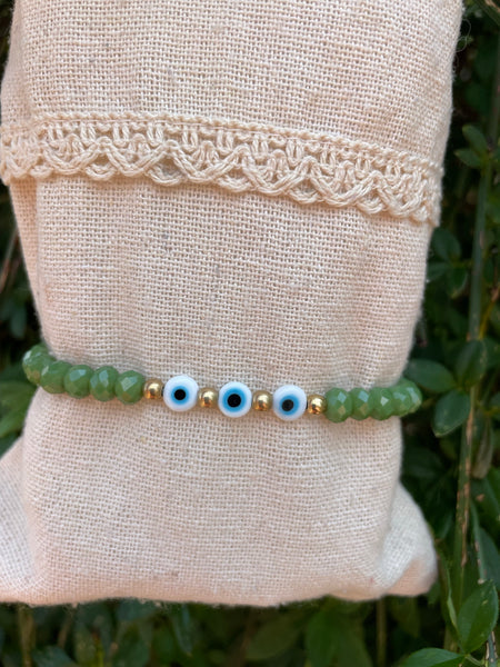 Bracelet élastique en perles de verre à facettes forme Oblate et Oeil Nazar Boncuk