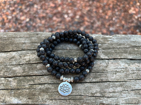 Bracelet Mala tibétain en Pierre de Lave et breloque Lotus