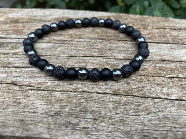 Bracelet élastique de Lithothérapie "Triple Protection" Pierre de lave, Hématite et Onyx noire