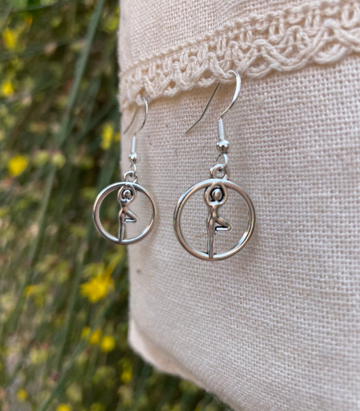 Boucles d'oreilles avec breloque argentée
