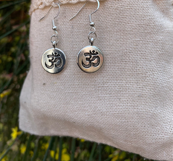 Boucles d'oreilles avec breloque argentée