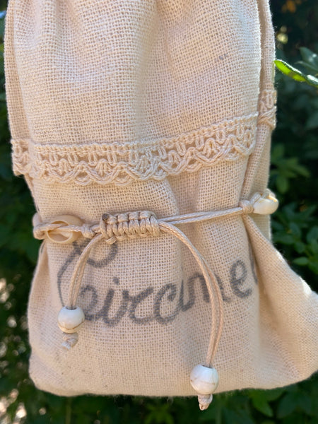 Chaîne de cheville beige en coquillages cauris