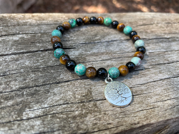 Bracelet élastique de Lithothérapie "Triple Protection" Oeil de Tigre, Turquoise Africaine et Onyx noire