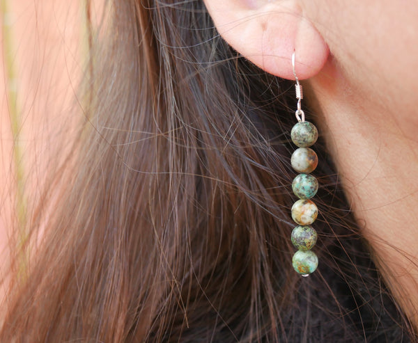Boucles d'oreilles pendantes en Turquoise Africaine foncée